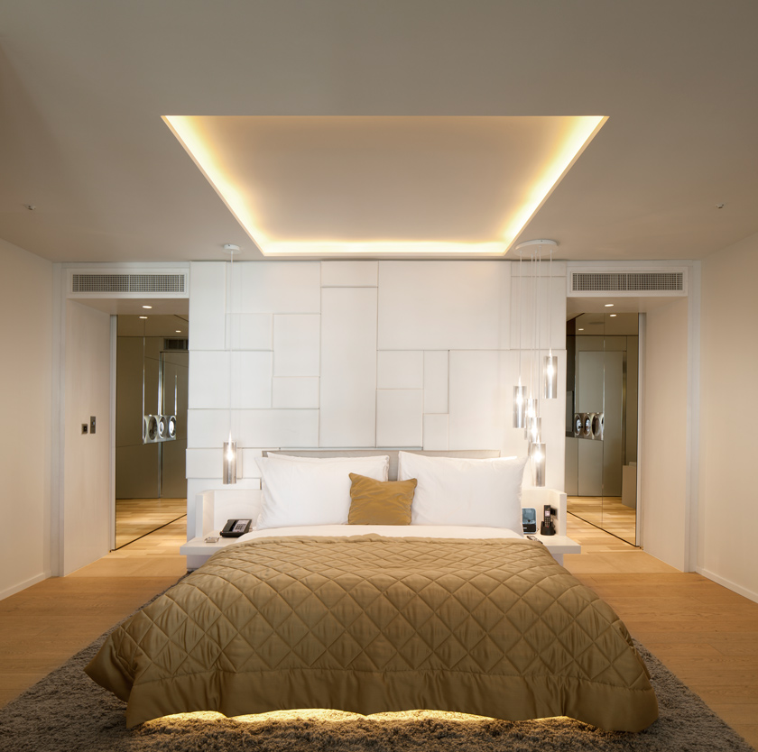 cama iluminación LED cálido módulo separador dormitorio baño