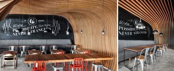 OOZN Design crea Six Degrees Coffee, una caverna con listones de madera ondulantes